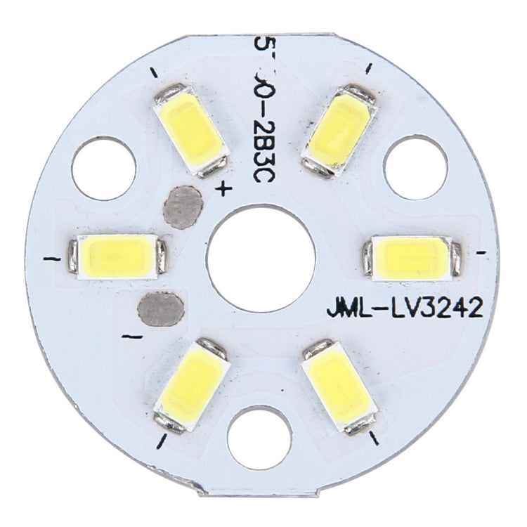 Circular LED light board close-up with 6 white SMD chips on a metal disk