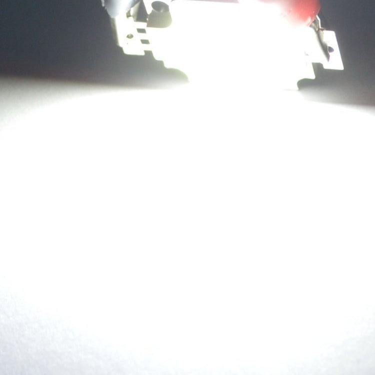 Bright white LED light beam, partially visible from a small LED module