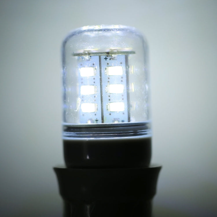 E27 LED bulb lit with cool white light, showing LED chip array