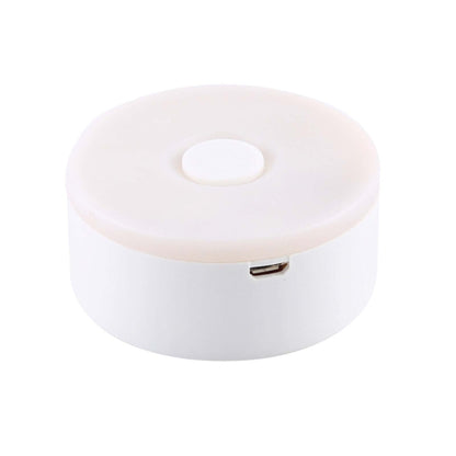 White round USB rechargeable LED night light with top oval button
