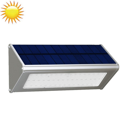 Triangular solar motion sensor wall light in silver, with LED panel and blue solar panel