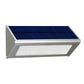 Triangular solar wall light in silver with blue solar panel and rectangular LED panel