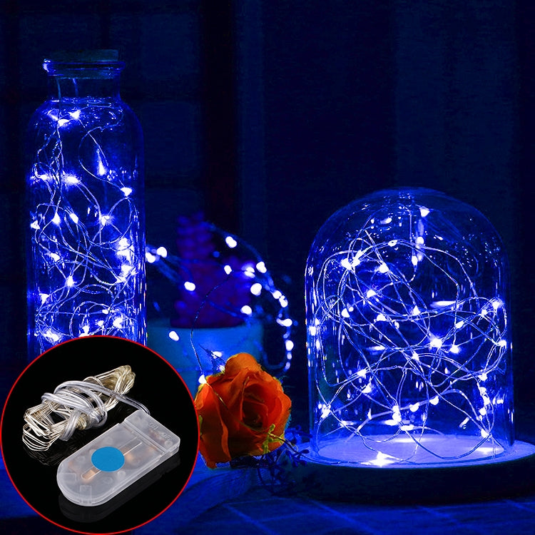Blue LED fairy string lights with clear CR2032 battery holder and glowing wire strands