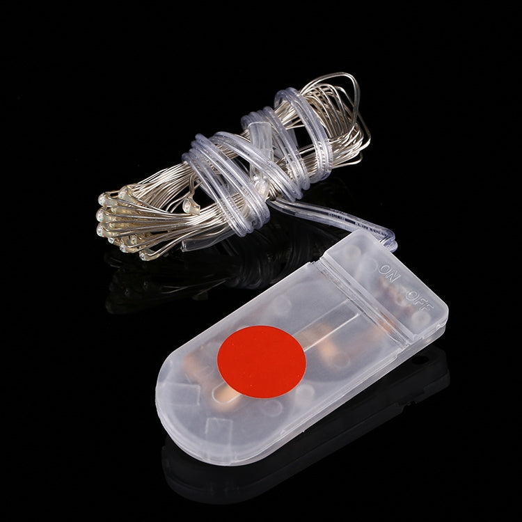 Red LED fairy string lights, clear battery holder with red button and wired coil