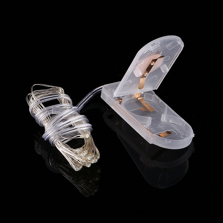 LED fairy lights set with clear battery case, copper contacts, and wire bulb strands