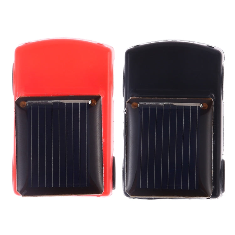 Solar panel housings for toy jeep, red and black side by side