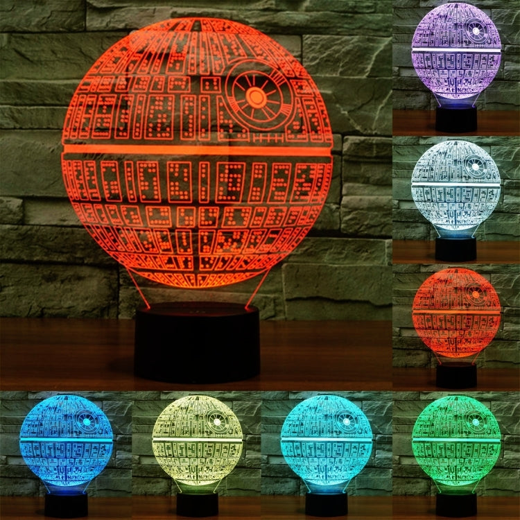 Death Star style desk lamp with glowing dome display on a round black base