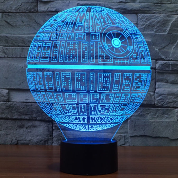 Blue glowing Death Star style dome desk lamp with circuit pattern on black base