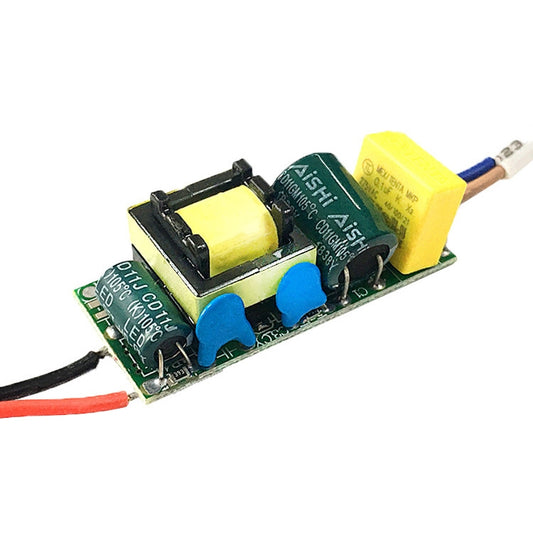 Isolated LED driver power supply PCB with yellow transformer and blue capacitors