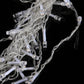 Close-up of clear LED icicle-style light bars with transparent wiring strands