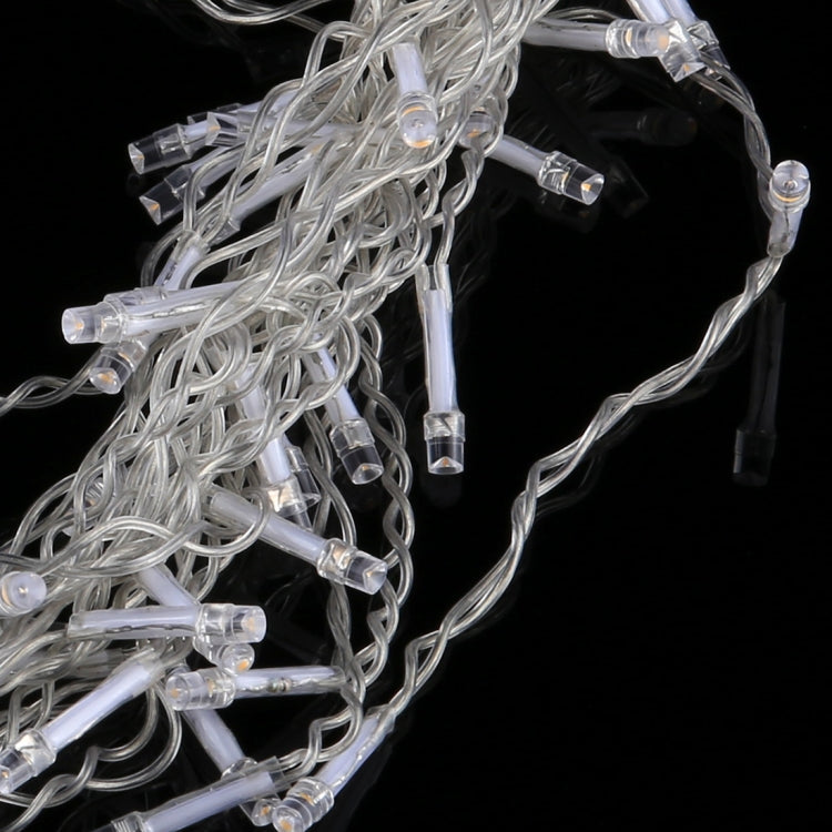 Close-up of clear LED icicle-style light bars with transparent wiring strands