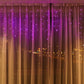 Purple LED icicle-style curtain string lights hanging with clear hanging bar ends