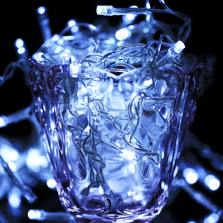 Cool blue glowing LED icicle-style string lights with clear plastic light bars