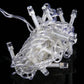 LED curtain string light strands with clear bulb covers and transparent wire.