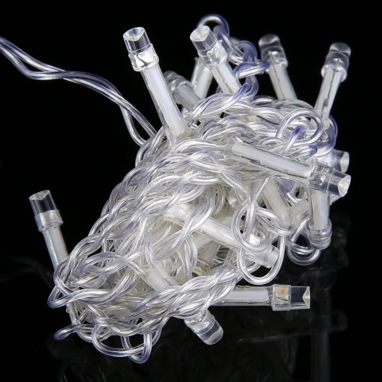 LED curtain string light strands with clear bulb covers and transparent wire.