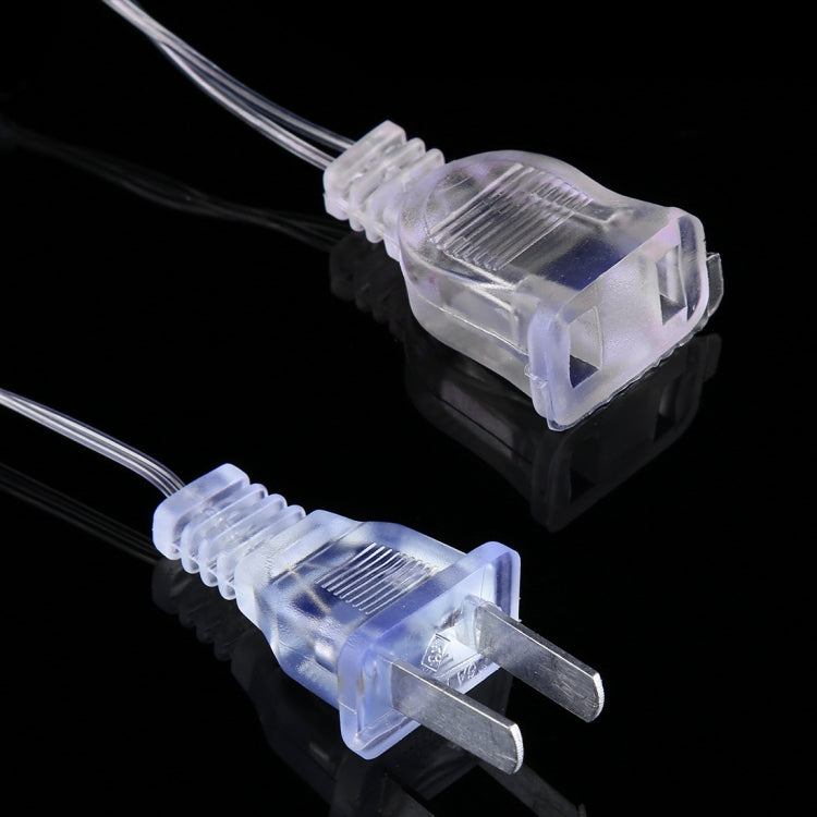 LED curtain light power plug with inline connector and transparent cord.