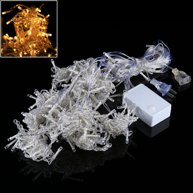 LED curtain string lights set with controller and clear bulbs on white wire.