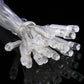 Close-up of clear LED bulbs on an LED reticular string light wire set