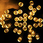 Warm yellow LED string lights with round bulbs and clear cable