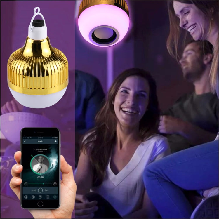 Gold LED music light bulb glowing in purple with hanging loop