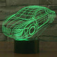 Car-shaped wireframe desk lamp, green glow with round headlights and side stripes