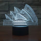 Sydney Opera House style desk lamp with white LED line art, on black base