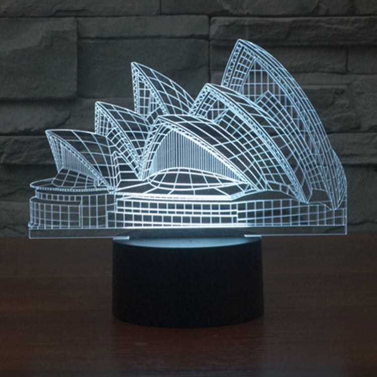 Sydney Opera House style desk lamp with white LED line art, on black base