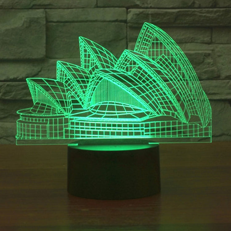 Sydney Opera House style LED desk lamp with bright green glowing architectural outline