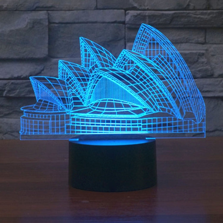 Sydney Opera House style LED desk lamp with blue glowing architectural outline