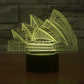 Sydney Opera House style LED desk lamp with yellow glowing architectural outline