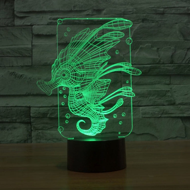 Green glowing hippocampus 3D desk lamp design on clear panel