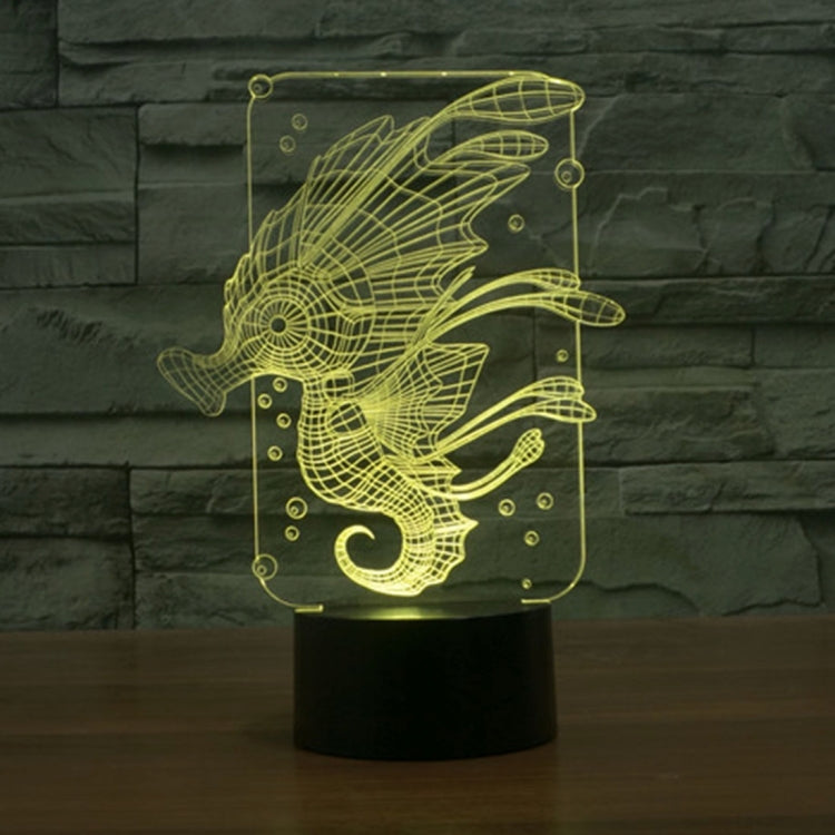 Yellow glowing hippocampus 3D desk lamp design on clear panel