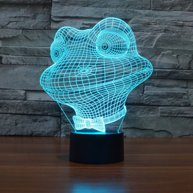 Frog-shaped desk lamp with glowing cyan blue wireframe design on a black base