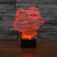 Orange wireframe frog night light on black base, glowing
