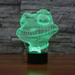 Green wireframe frog lamp with black base, glowing front view