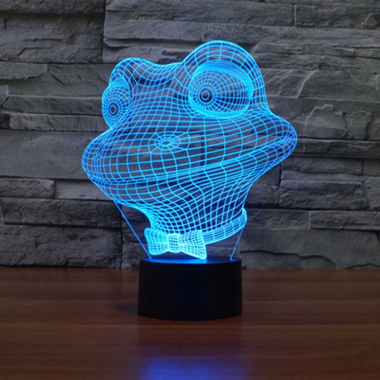 Blue wireframe frog night light on black base, glowing