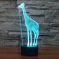 Giraffe-shaped LED night light desk lamp with blue glow and black base