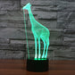 Green glowing giraffe desk night light with black cylindrical base