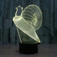Snail-style 3D desk lamp with yellow glowing wireframe spiral on black base