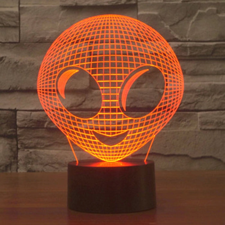 Alien-style desk lamp with glowing orange wireframe alien head and dark base