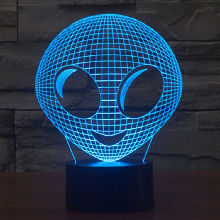 Alien-style desk lamp with glowing blue wireframe alien head and dark base