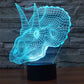 Dinosaur-shaped LED desk night lamp with blue wireframe glow
