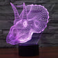 Dinosaur-shaped LED desk night lamp with purple wireframe glow