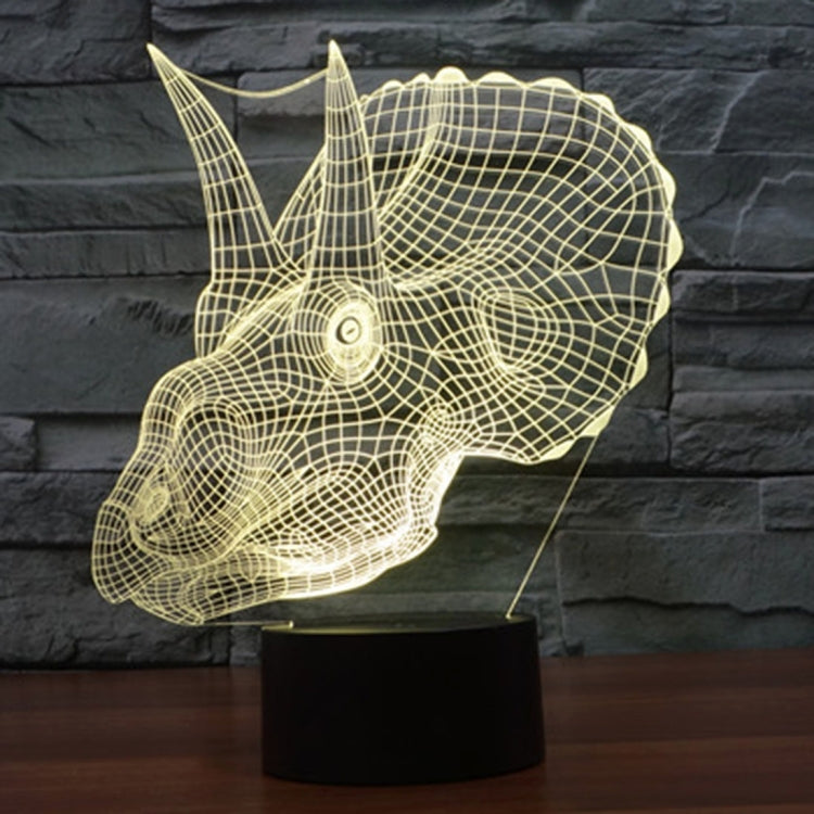 Beige dinosaur-shaped LED desk lamp with wireframe glow on stand