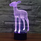 Deer-shaped LED night light with purple wireframe glow and black cylindrical base