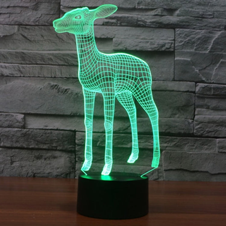 Deer-style 3D LED desk lamp with glowing green wireframe deer on black base