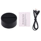 Black 3D desk lamp base with USB cable and 3D lamp user guide