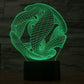 Abstract 3D wire desk lamp with green glow on black base