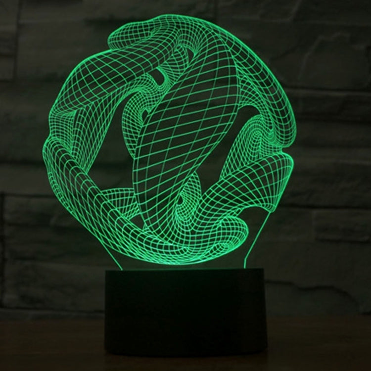 Abstract 3D wire desk lamp with green glow on black base
