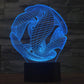 Abstract 3D wire desk lamp with blue glow on black base